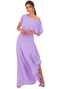 Woman in a lavender off-shoulder evening gown posing, wearing gold sandals