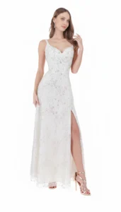 Model wearing an ivory sequined evening gown with a sweetheart neckline and a high slit.