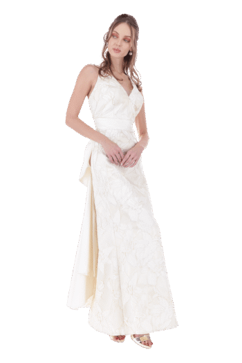 Vestido largo con escote halter de cauda con moño y falda corte sirena.