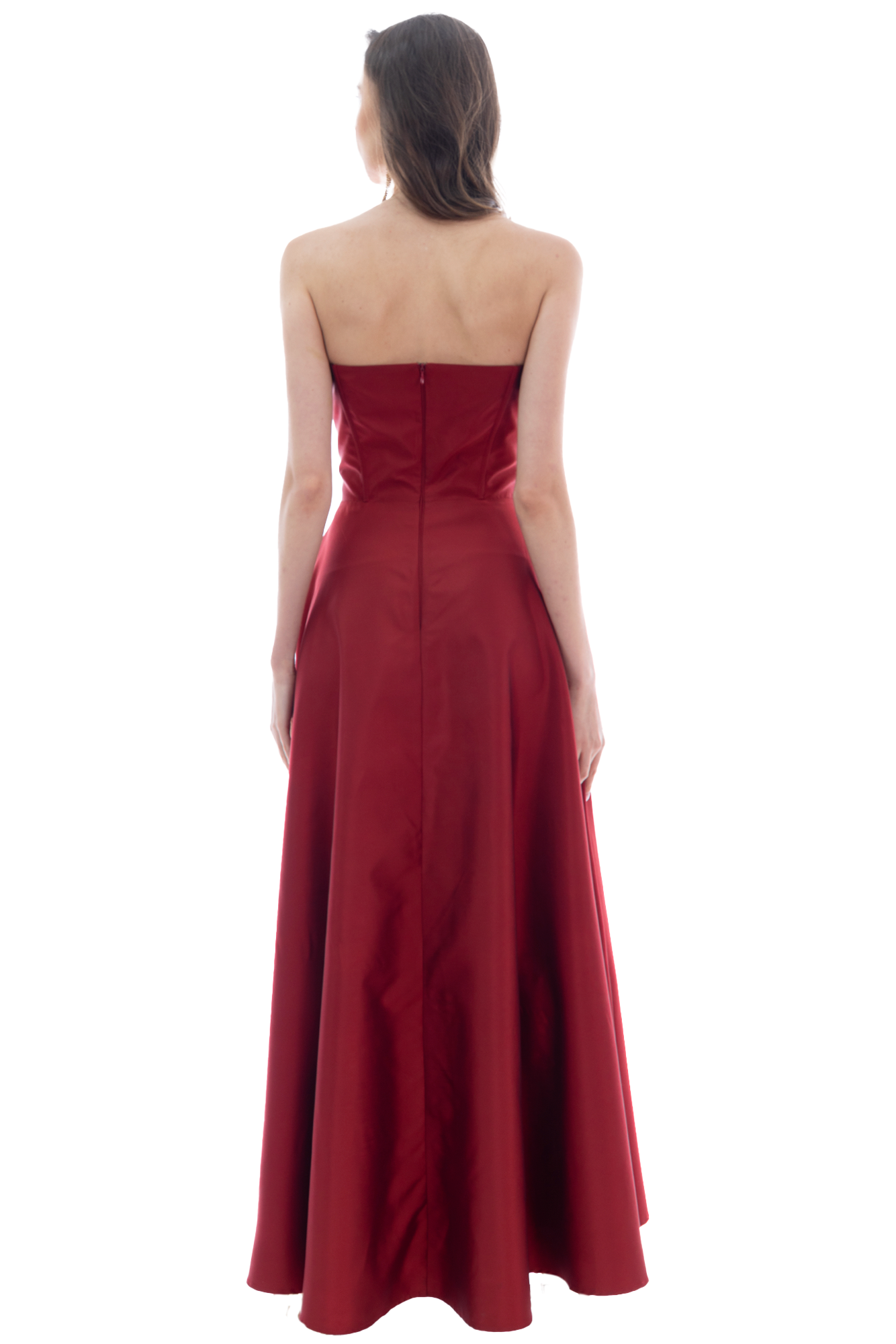 Back view of a woman wearing a strapless, floor-length red evening gown with a zipper down the center of the back.