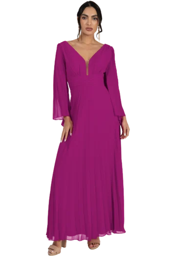 Woman modeling a magenta floor-length pleated gown with a plunging V-neck, long sheer sleeves, and drop earrings.