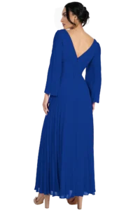 Back view of a woman in a cobalt blue pleated evening gown with a deep V back, gold earrings, and nude heels.