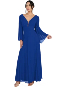 Woman wearing a royal blue floor-length pleated gown with a deep V-neck and sheer long sleeves, beige sandals visible on the feet.