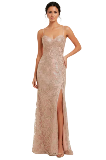 Woman in a blush pink lace evening gown with thin straps and a thigh-high slit.