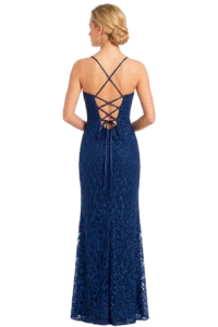 Back view of a woman wearing a navy blue lace evening gown with crisscross back straps and a ribbon-tinished lace-up detail