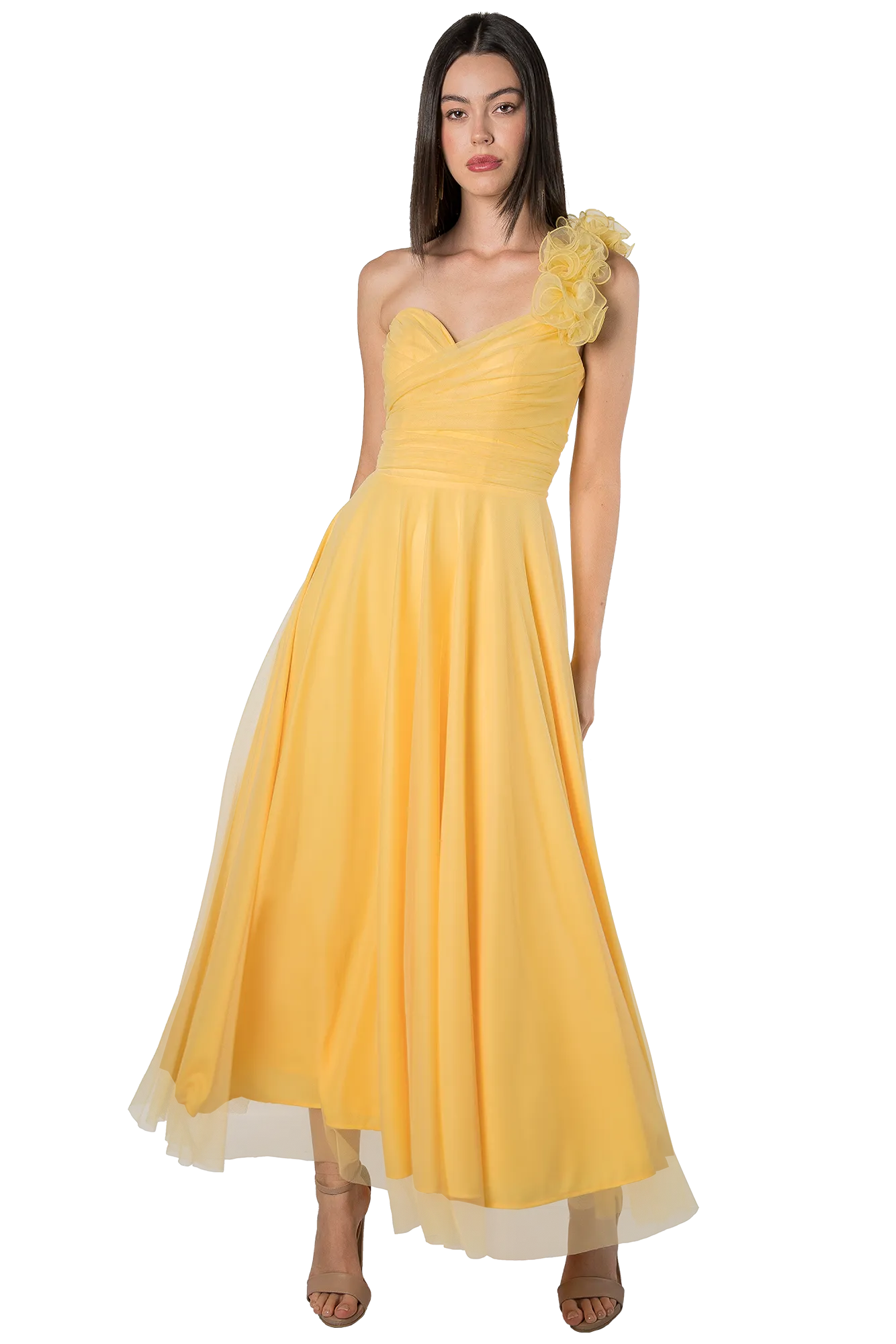 Woman in a yellow one-shoulder evening gown with a ruffled shoulder and flowing skirt.