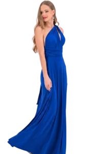 Woman in a royal blue halter-style evening gown looking to her left, with long wavy blonde hair and statement earrings.
