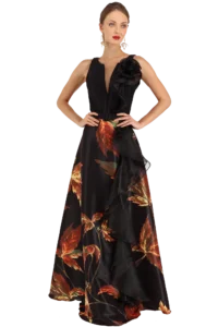 Vestido largo negro con estampado otoñal en terracota y dorado, escote V con transparencia central, escarola en talle y flor 3D en hombro, colección Massima otoño-invierno, vista frontal