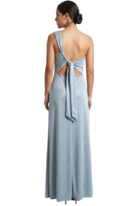 Back view of a woman wearing a light blue satin evening gown with an open back and tied bow at the waist.",