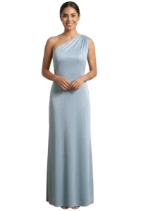Full-length portrait of a smiling woman in a light blue one-shoulder gown, standing barefoot with hands clasped in front.