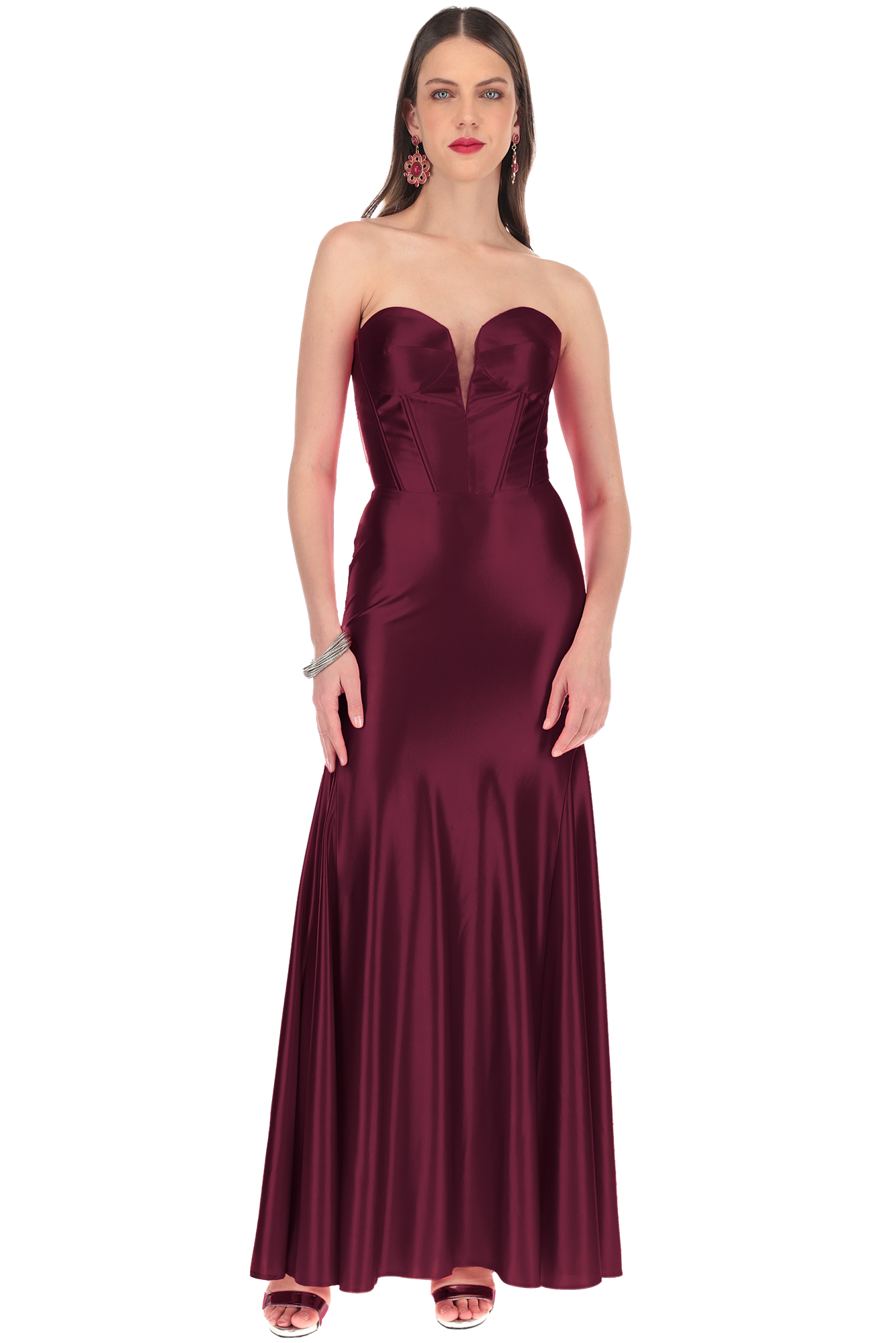 Full-length burgundy satin strapless gown on a model with red lipstick and statement earrings.