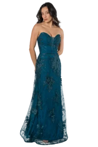 Woman in a teal lace strapless evening gown posing with hands behind her back, wearing long drop earrings.