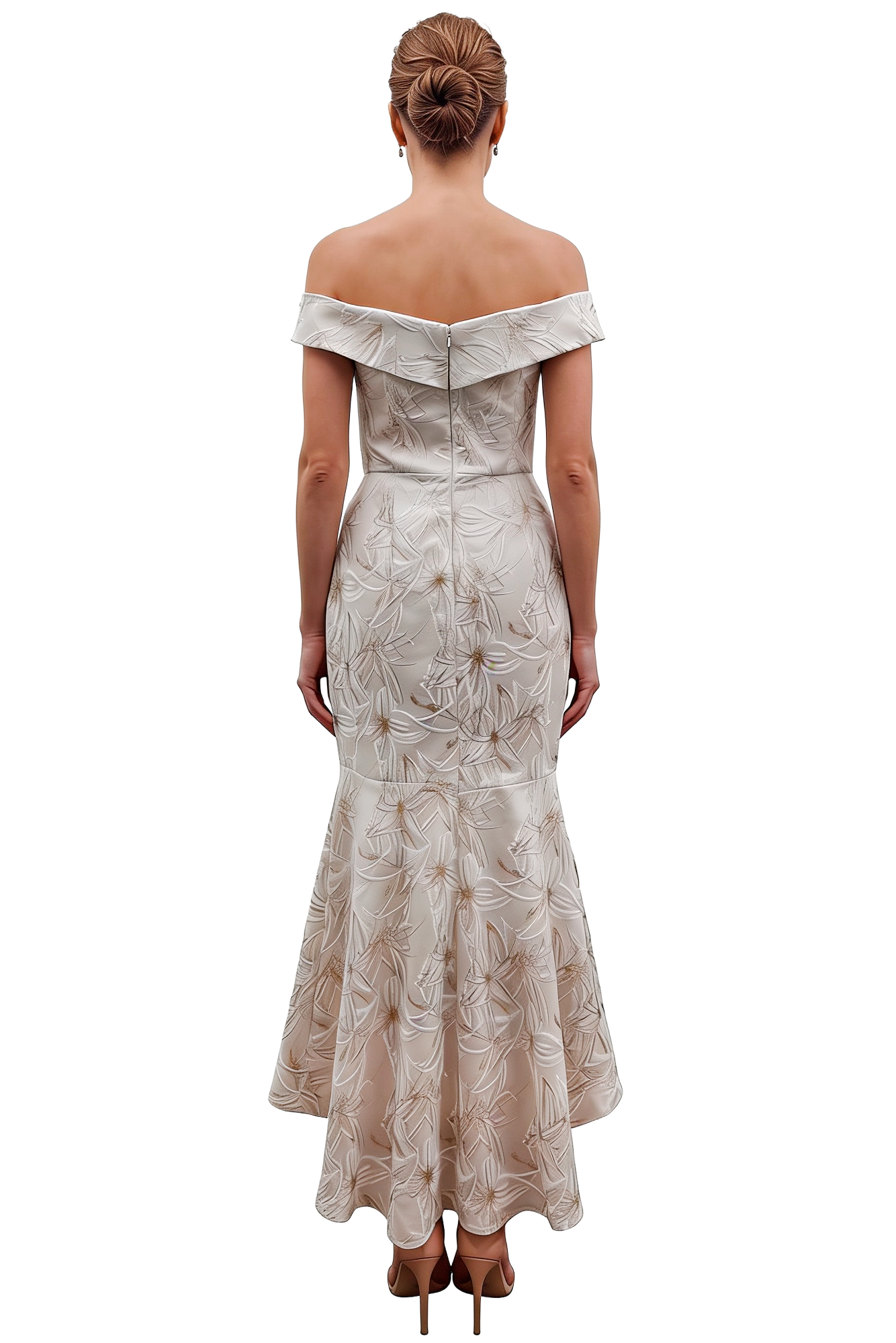 Back view of a woman in an off-shoulder, floor-length floral gown with a braided bun hairstyle and nude heels.