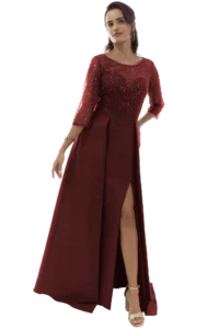 Full-body image of a woman wearing a burgundy sequined top and matching high-slit skirt with beige heeled sandals, posing gracefully.