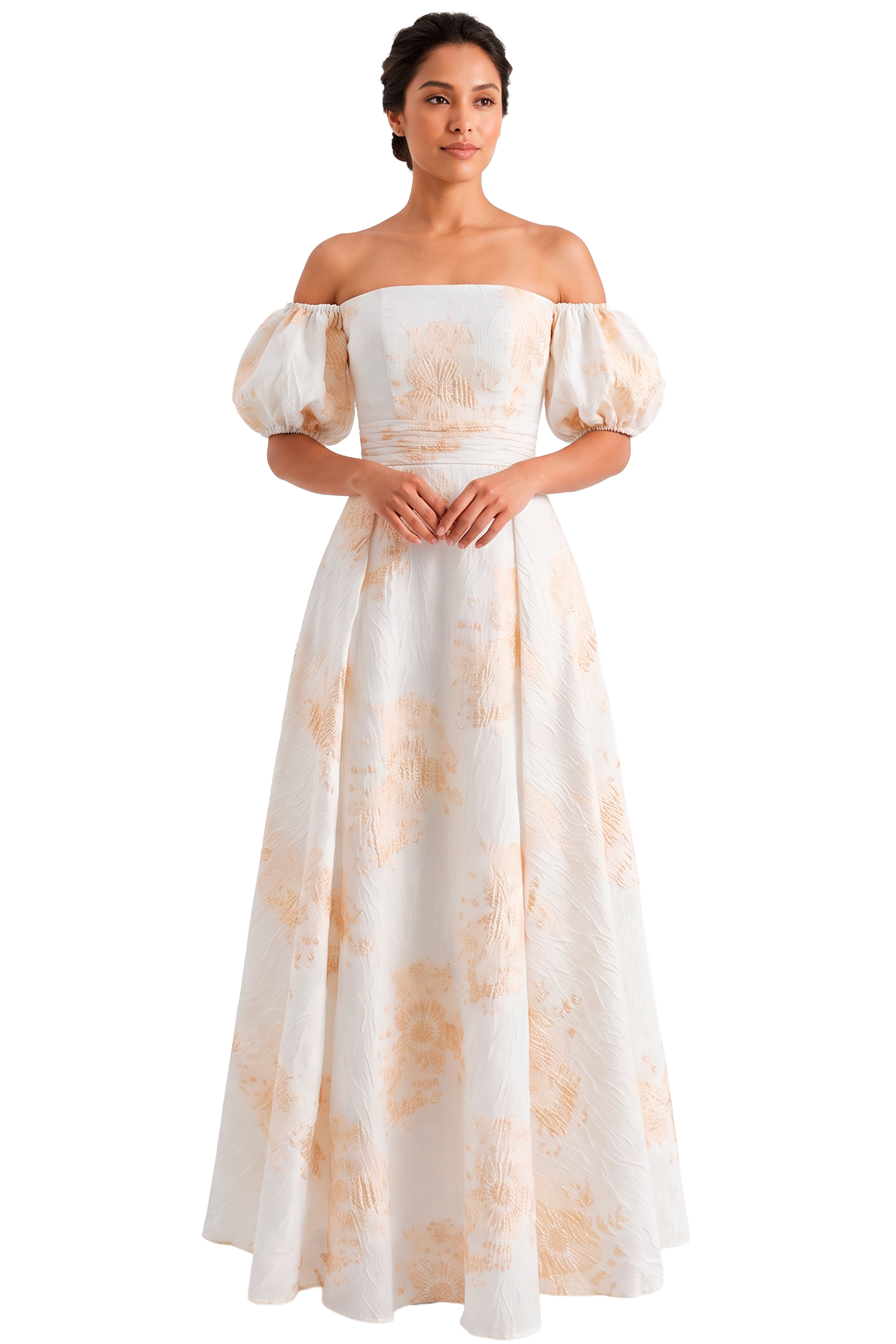 Elegant woman in a white off-shoulder, floor-length gown with peach floral patterns, standing with hands clasped.