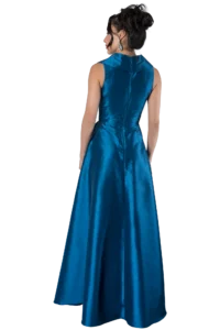 Woman in a strapless blue satin gown seen from the back, with an updo and dangling earrings, standing upright.